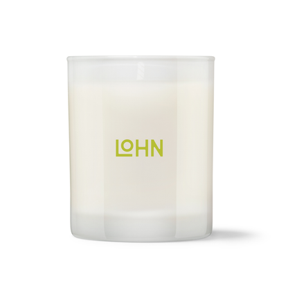 White candle with 'LOHN' logo on a white background