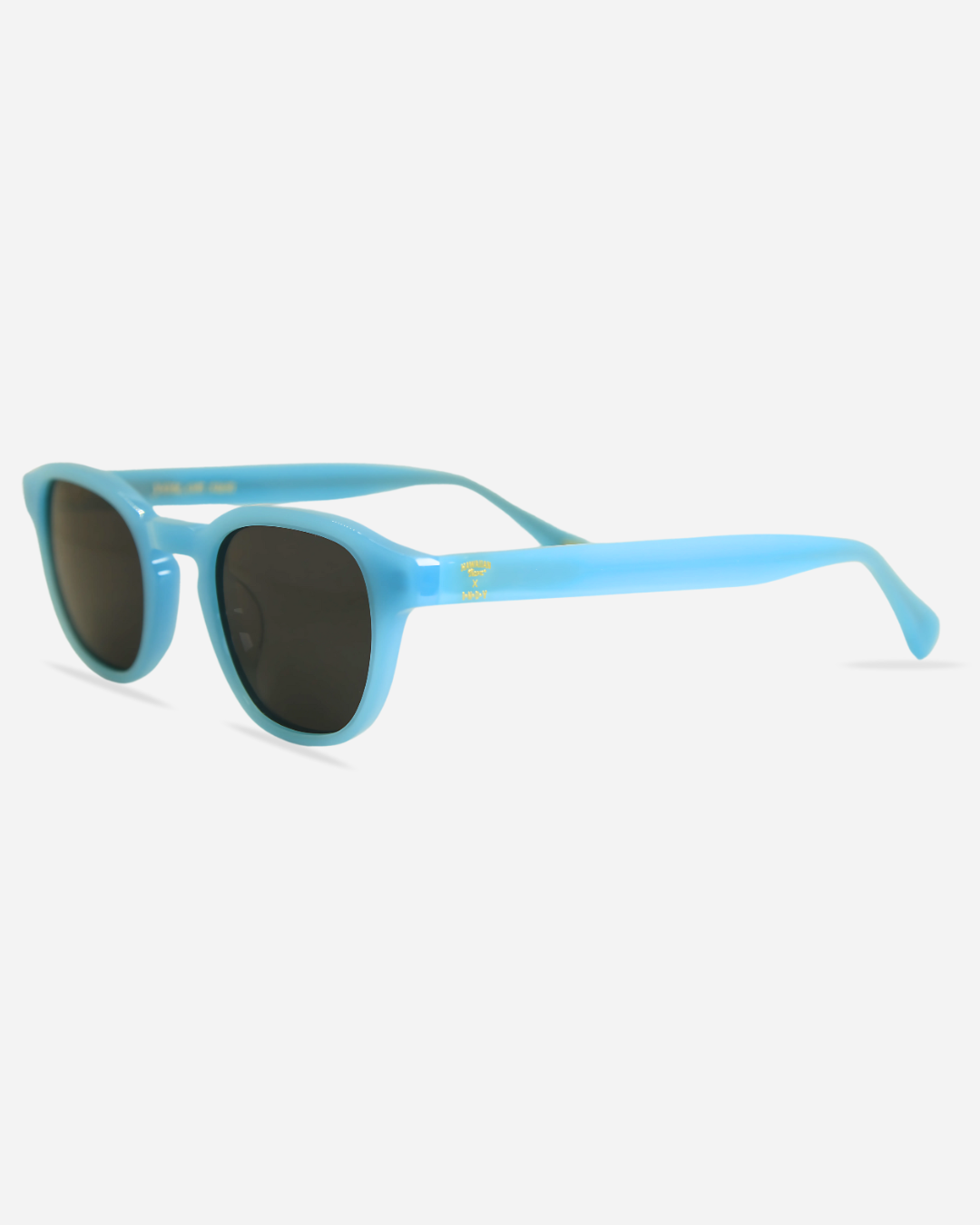 Blue Daytona sunglasses with dark lenses on a white background
