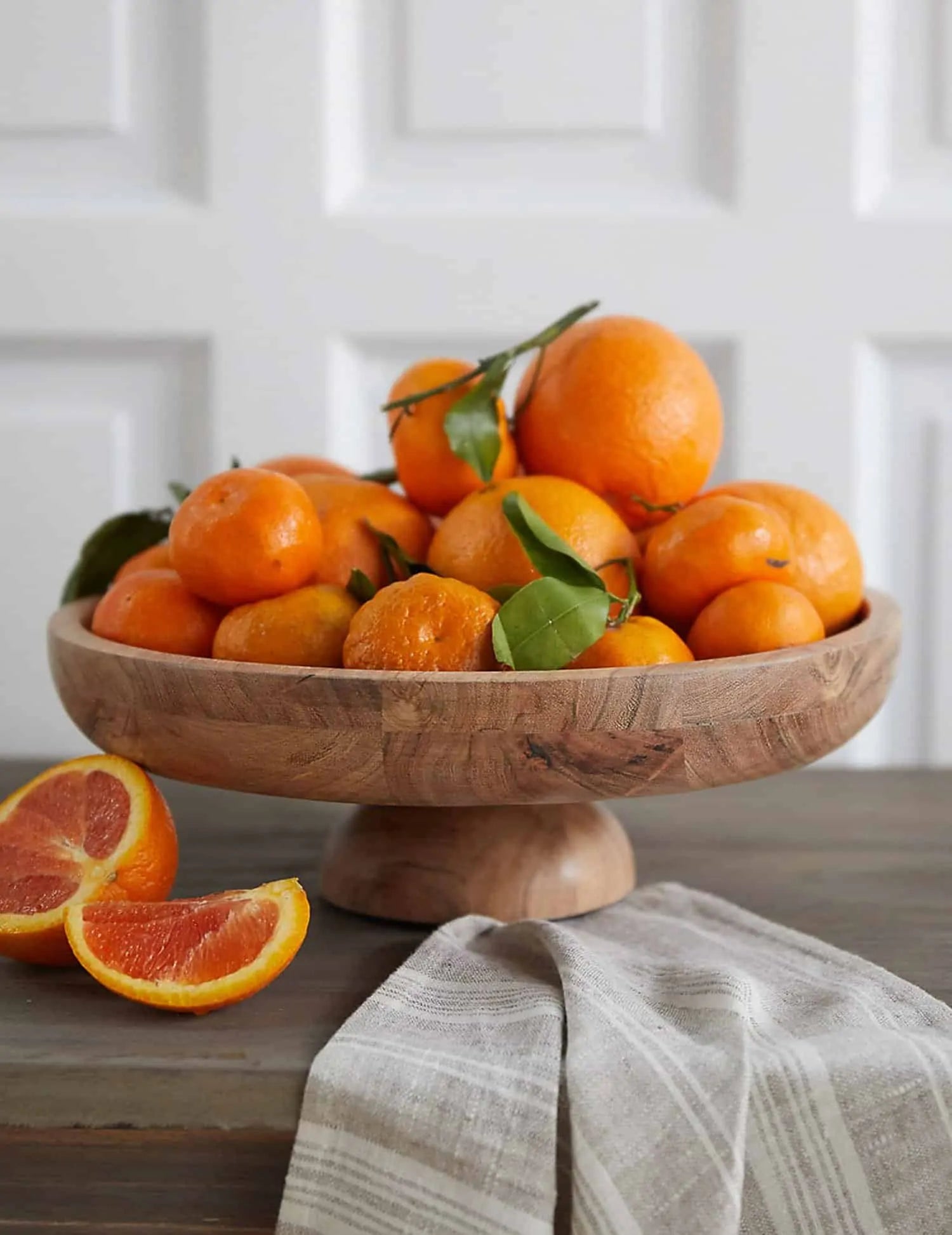 Oranges in a wood bowl