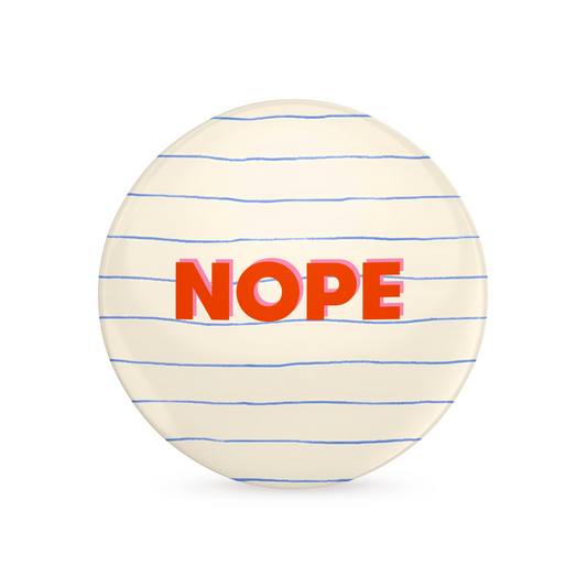 Round object with 'NOPE' text on a white background